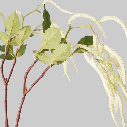 White cascading artificial amaranthus stem, close-up
